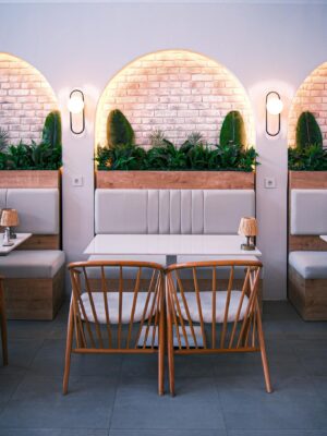 Stylish restaurant interior featuring modern decor, cozy seating, and warm lighting.